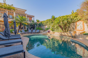 Beautiful outdoor pool with loungers in Lagos Portugal at the Dom Manuel