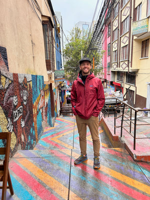 Digital nomads travelling throughLa Paz in Bolivia. Couple travel, slow travel, working remotely, vegan travel, budget travel. Beautiful and colourful street.