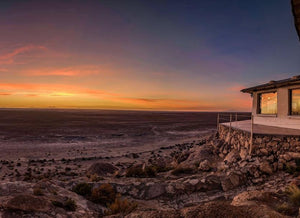 Digital nomads travelling through Salt Flats, Bolivia. Couple travel, slow travel, working remotely, vegan travel, budget travel. Budget luxury hotel made of salt on edge of Salt Flats near Uyuni. Walking distance from Salt Flats. Bar, spa, sauna, pool, games room, nice rooms, restaurant.