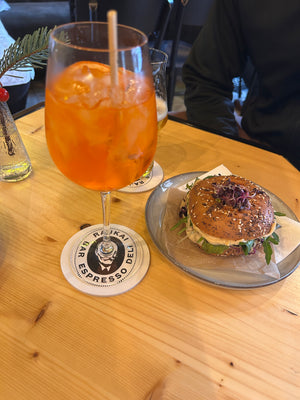 Aperol spritz and vegan bagel with hummus and greens from Rajkai in Budapest Hungary digital nomads