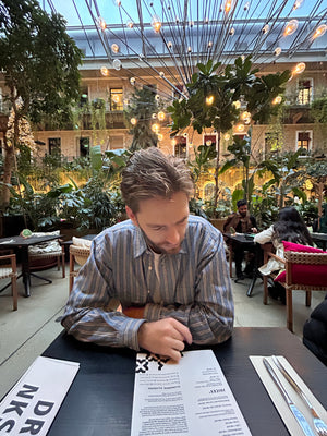 Reading menu at TwentySix in Budapest Hungary vegan plant-based digital nomads