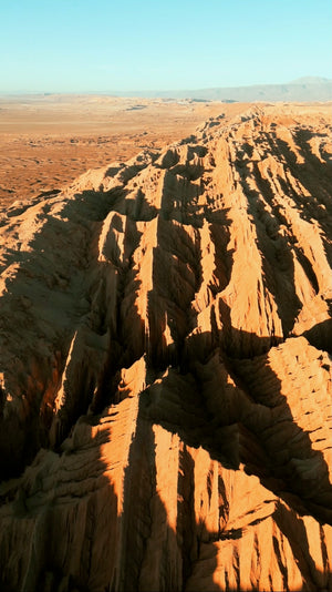 Digital nomads travelling through Atacama Desert, Chile. Couple travel, slow travel, working remotely, vegan travel, budget travel. Valle de la luna (Valley of the Moon) near San Pedro de Atacama, Chile.