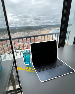 Remote work setup in Nazaré, Portugal Airbnb with laptop and view