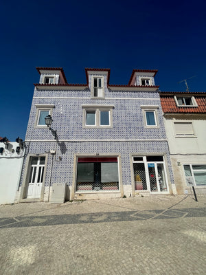 Beautiful and colourful blue and terracotta building in Cascais Portugal