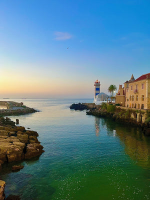 Beautiful and picturesque lighthouse near Cascais Portugal seen during morning run walk