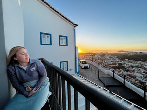Portugal Nazare sunrise overlooking beautiful Nazare during our slow travel digital nomad budget stay.