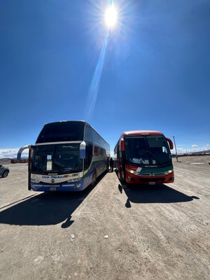 Digital nomads travelling through Bolivia and Chile. Couple travel, slow travel, working remotely, vegan travel, budget travel. Bus ride from Uyuni, Bolivia to Calama, Chile from the Salt Flats to the Atacama Desert.