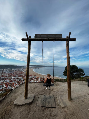 Baloiço da Ladeira (panoramic swing) in Naraze Portugal during our slow travel digital nomad budget stay