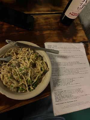 Delicious vegan plant-based spaghetti al bosque with soy bechamel served at the Garden restaurant in Lagos Portugal